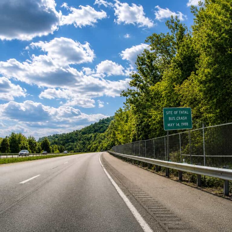 Southbound Interstate 71 near Carrollton, Kentucky, with the roadside sign marking the site of the fatal May 14, 1988 bus crash.