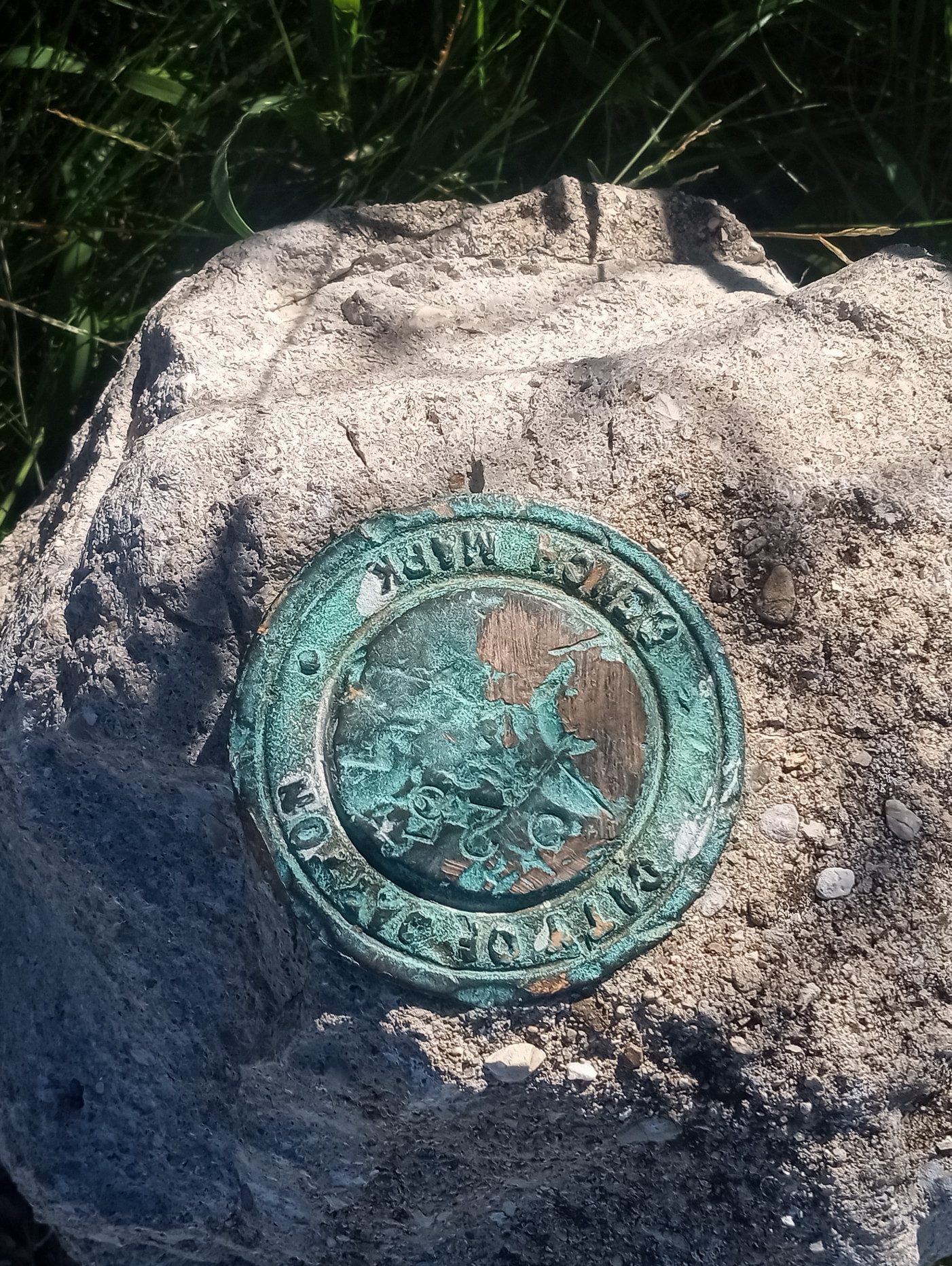 Unit III Ground Fixture Circular concrete or metal site fixture embedded in the ground at the former Dayton Project Unit III property
