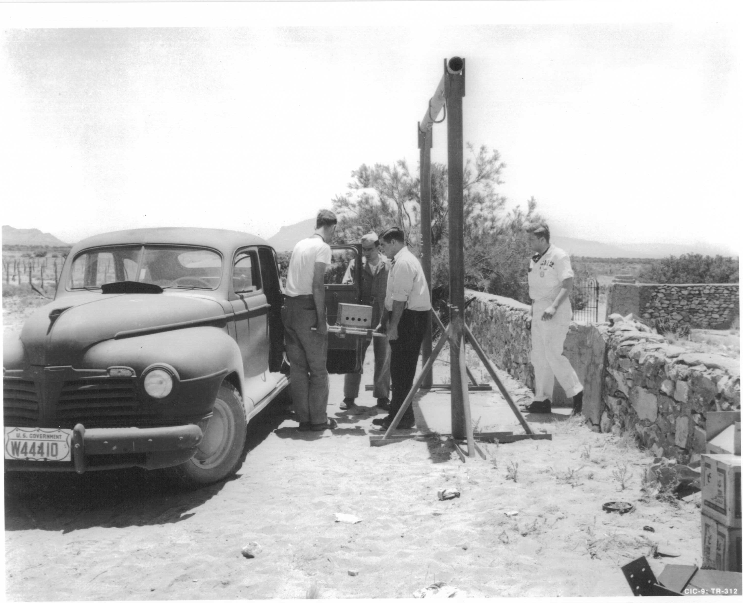 Manhattan Project personnel transporting Trinity bomb components